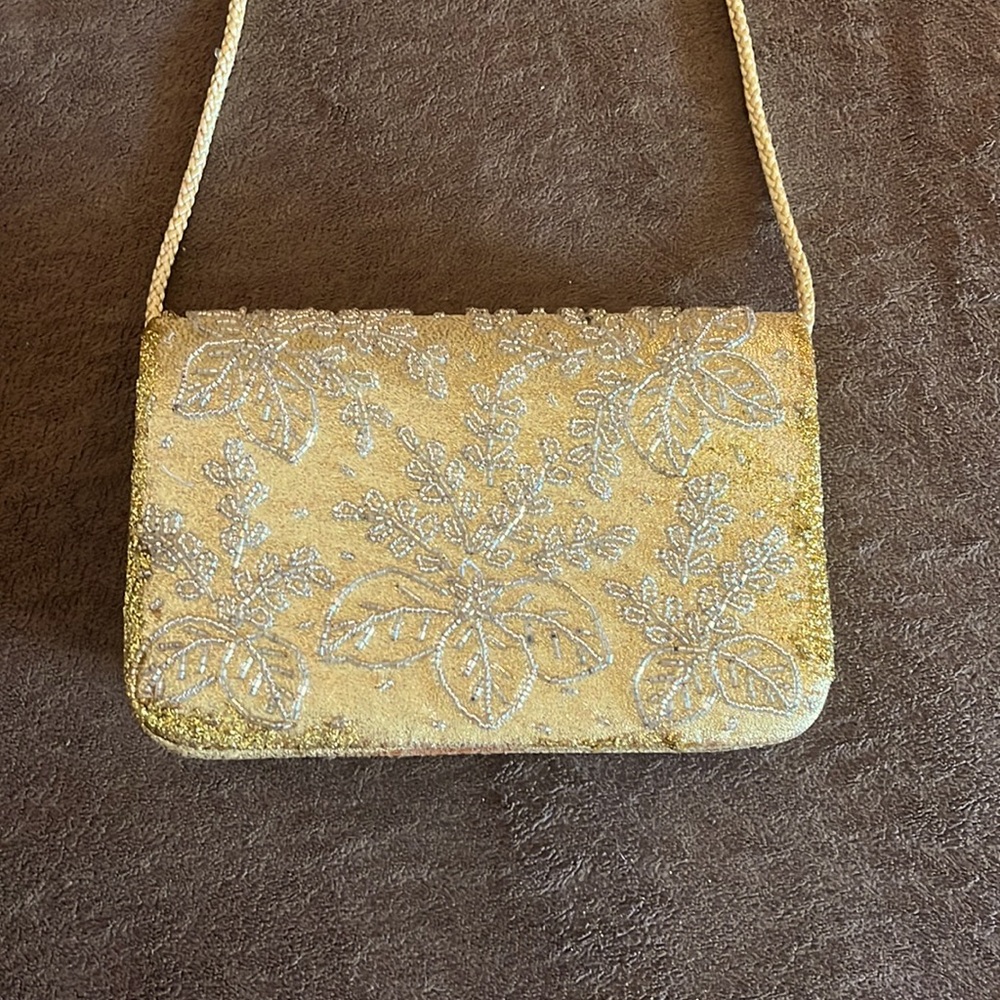 Gold clutch evening bag